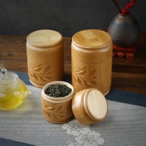 Trois boîtes à thé cylindriques en bambou sculpté