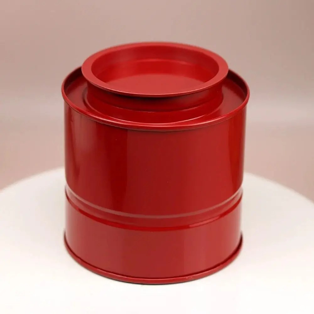 Boîte à thé vintage rouge en fer-blanc 90 × 95 mm