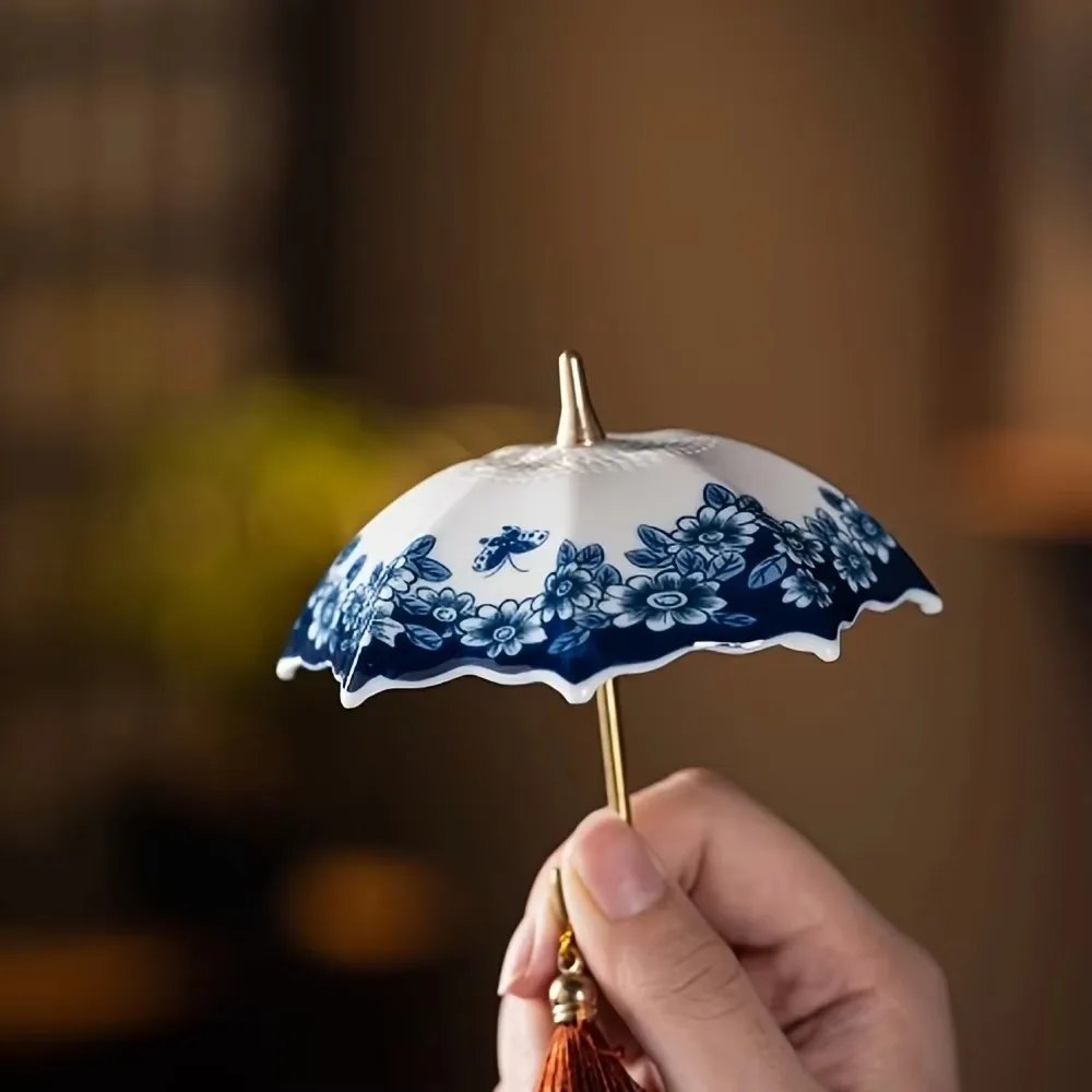 Infuseur à thé parapluie bleu et blanc
