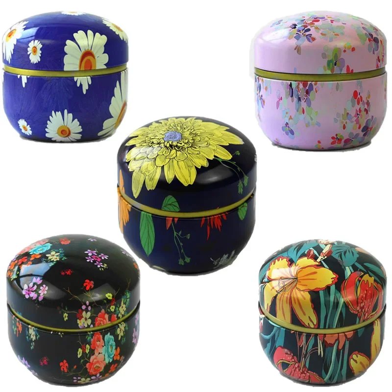 Lot de 8 boîtes à thé rondes en fer-blanc motifs floraux