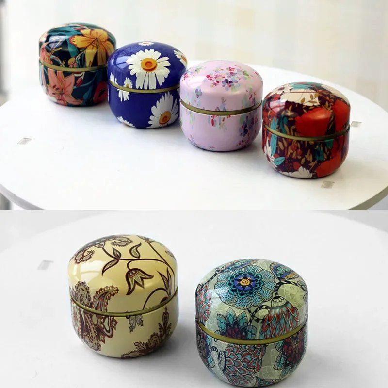 Lot de 8 boîtes à thé rondes en fer-blanc motifs floraux