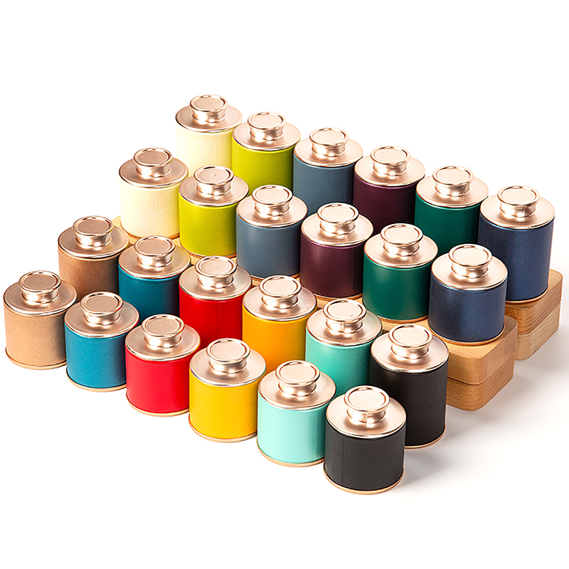 Petits caddies métal colorés pour thé