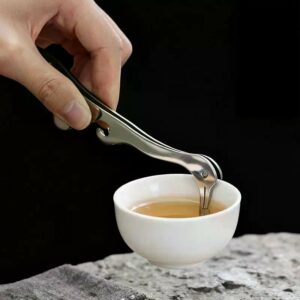 Pince à thé inox avec manche effet bois