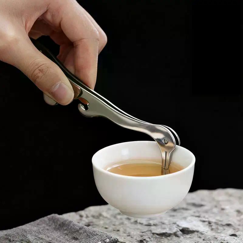 Pince à thé inox avec manche effet bois