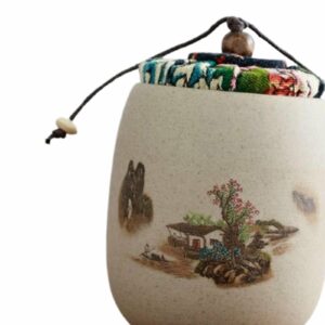 Petit pot à thé en céramique beige décoré d’un paysage ancien