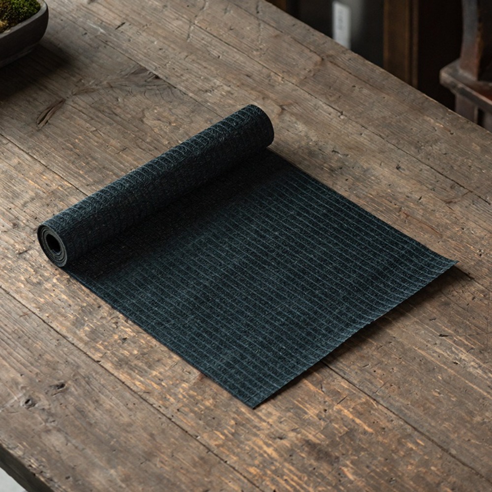 Tapis de thé en lin roulé